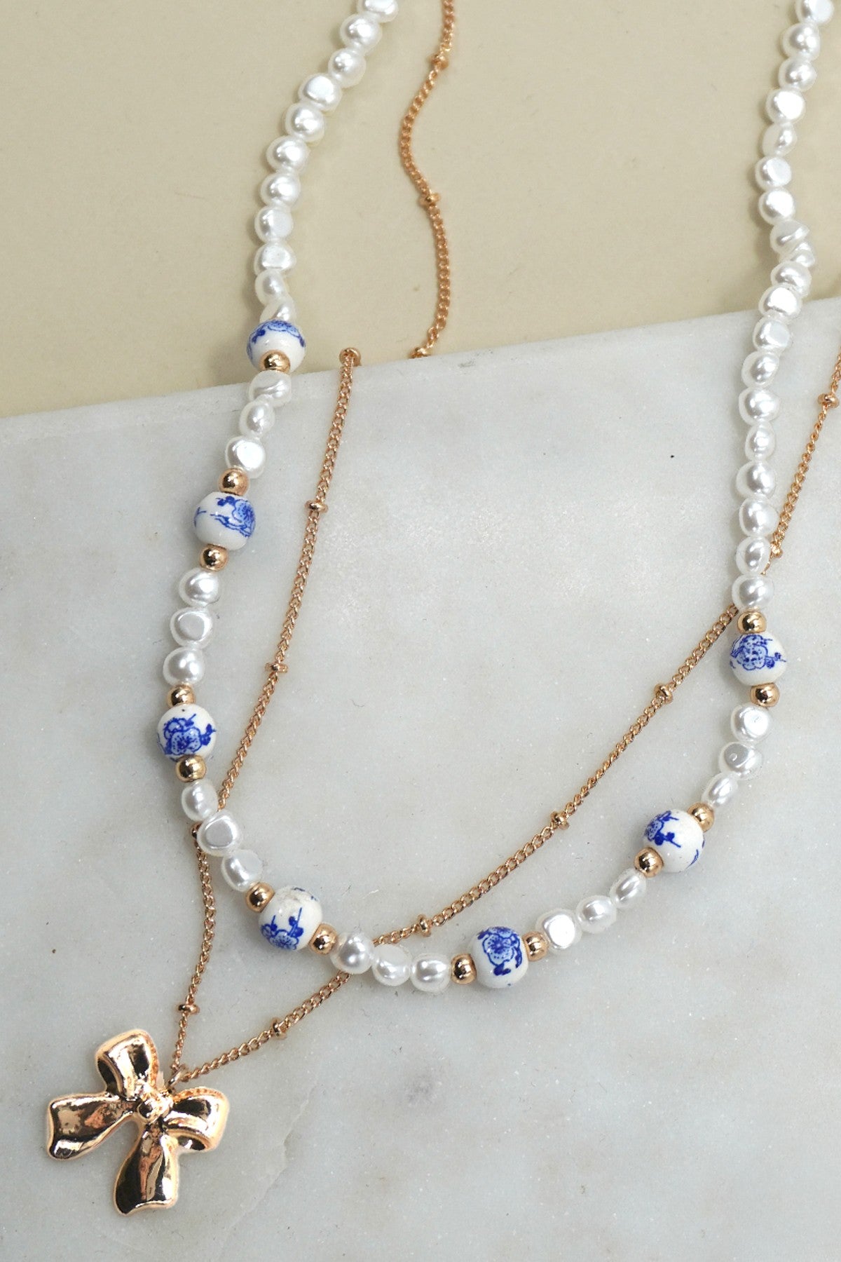 BLUE AND WHITE CERAMIC PORCELAIN PEARL BOW LAYER NECKLACE