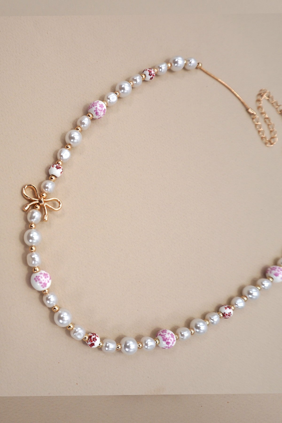 PINK CERAMIC PORCELAIN PEARL BOW NECKLACE
