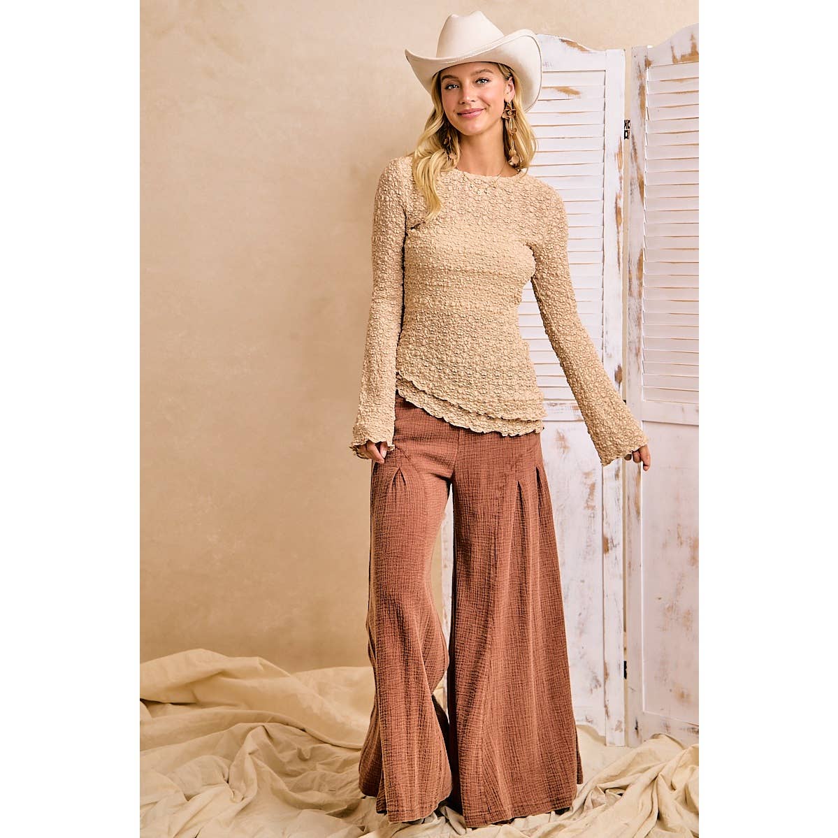 TEXTURED LACE KNIT DIAGONAL HEMLINE BELL SLEEVES TOP