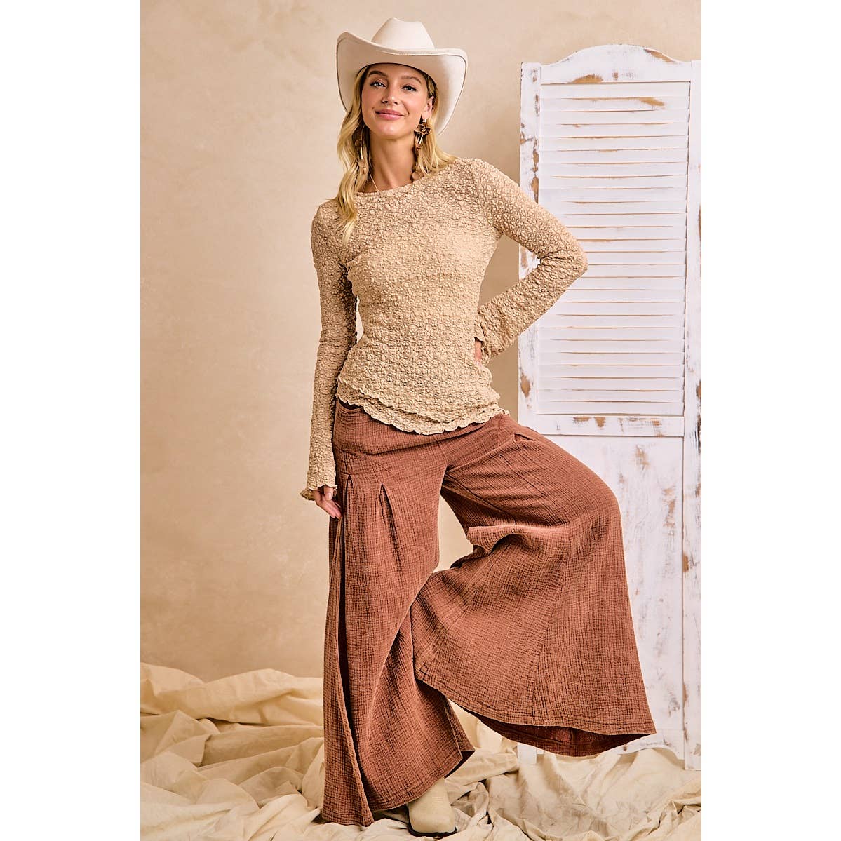 TEXTURED LACE KNIT DIAGONAL HEMLINE BELL SLEEVES TOP