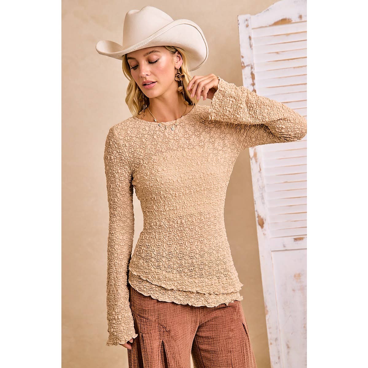 TEXTURED LACE KNIT DIAGONAL HEMLINE BELL SLEEVES TOP