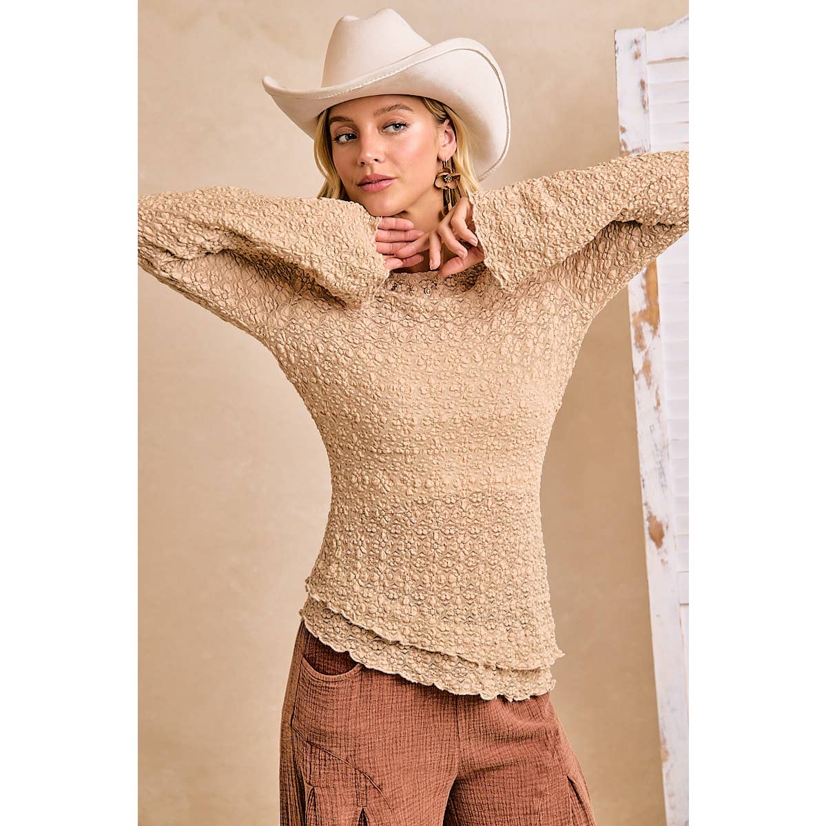 TEXTURED LACE KNIT DIAGONAL HEMLINE BELL SLEEVES TOP